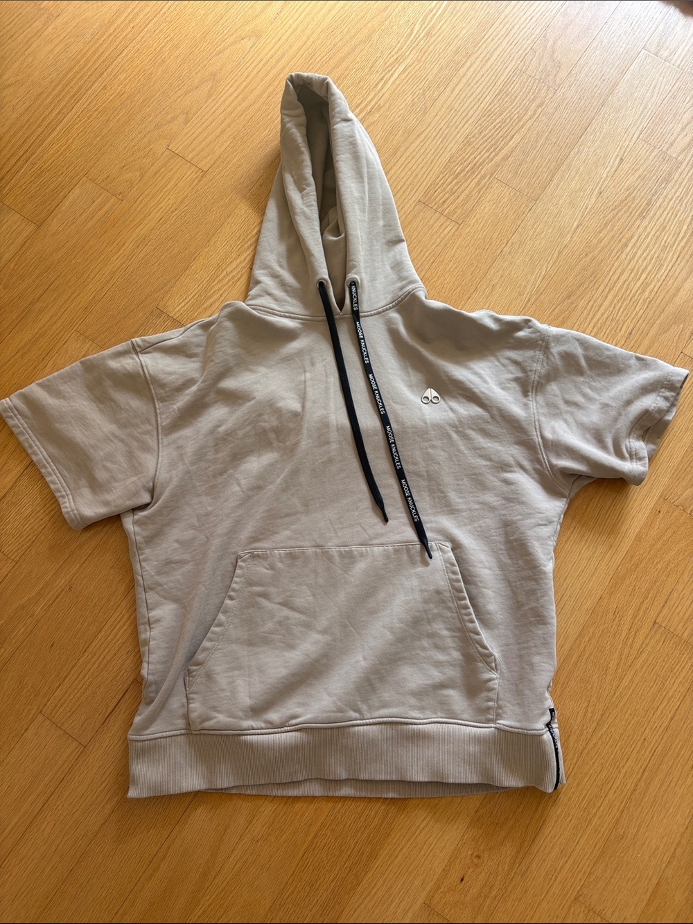 Moose Knuckles Short-Sleeve Hoodie in Light Beige with Black Drawstrings